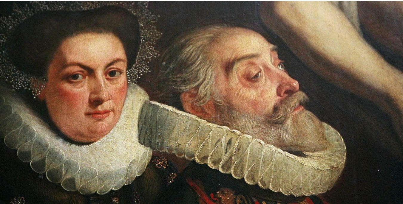 Close‑up of two individuals wearing ruffs, showing the intricate lacework and status connotations